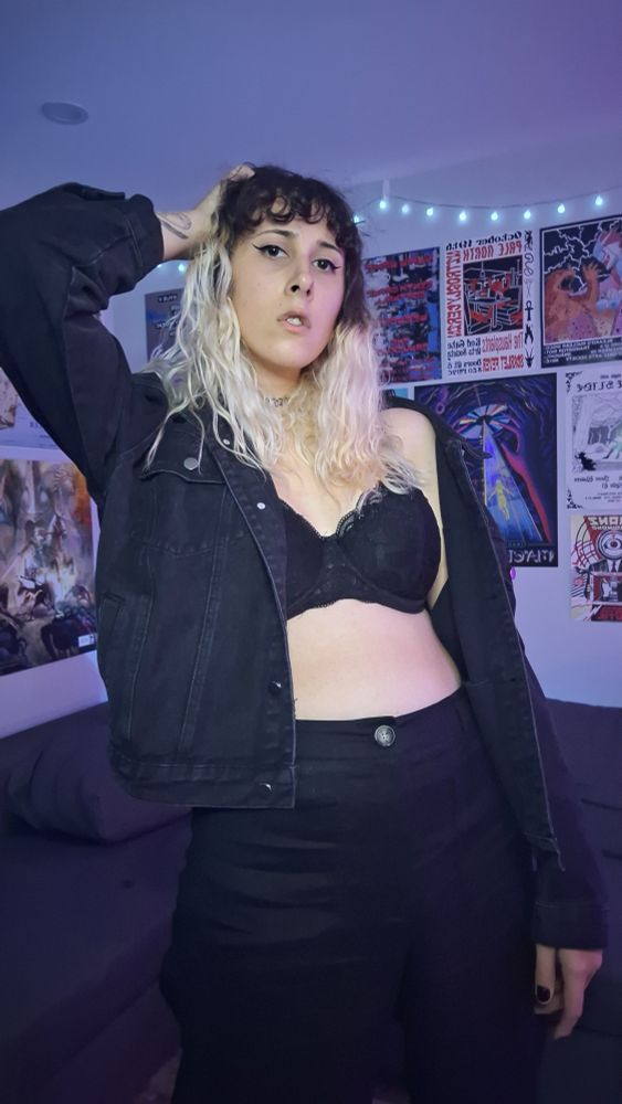 Nish Bae in the same outfit but a different pose 