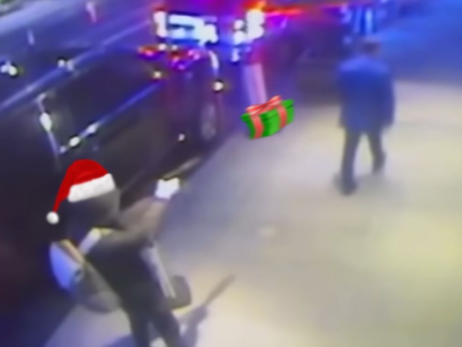 the ceo shooting but luigi has a santa hat and he's shooting a present