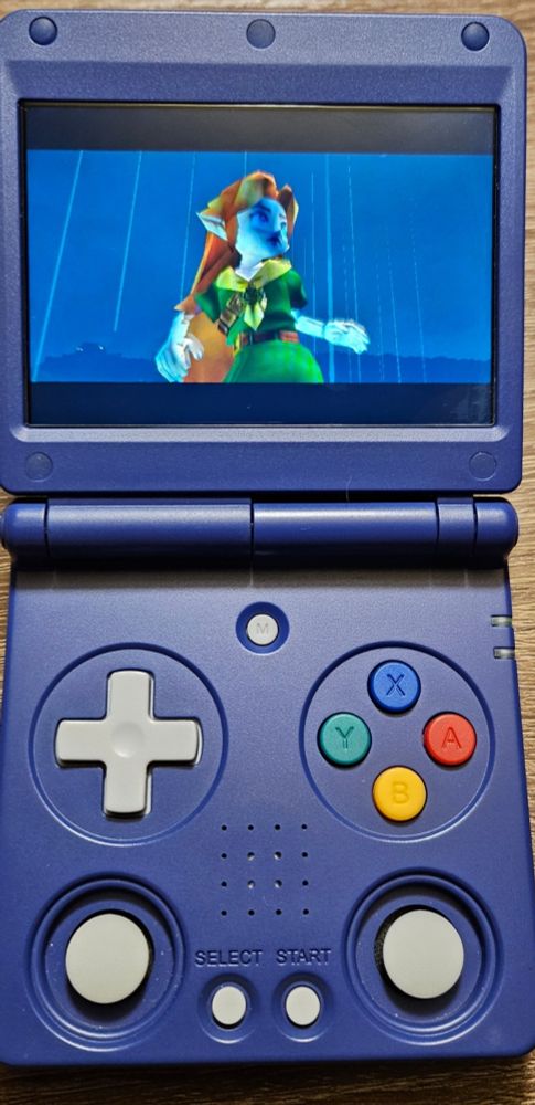 Anbernic RG 34XXSP running "Ship of Harkinian" with the "Malon Heroine" player mod during the intro cutscene