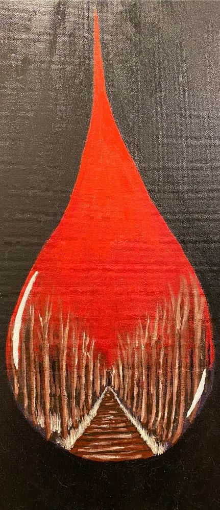 Large blood drop on black background with dead wood forest lining an old path further into the woods. 