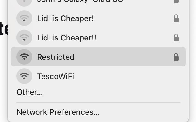 Screenshot of a laptop's wifi menu options, showing a "TescoWifi" option (full strength), a "Lidl is Cheaper!" option and a "Lidl is Cheaper!!" (two exclamation points) option.