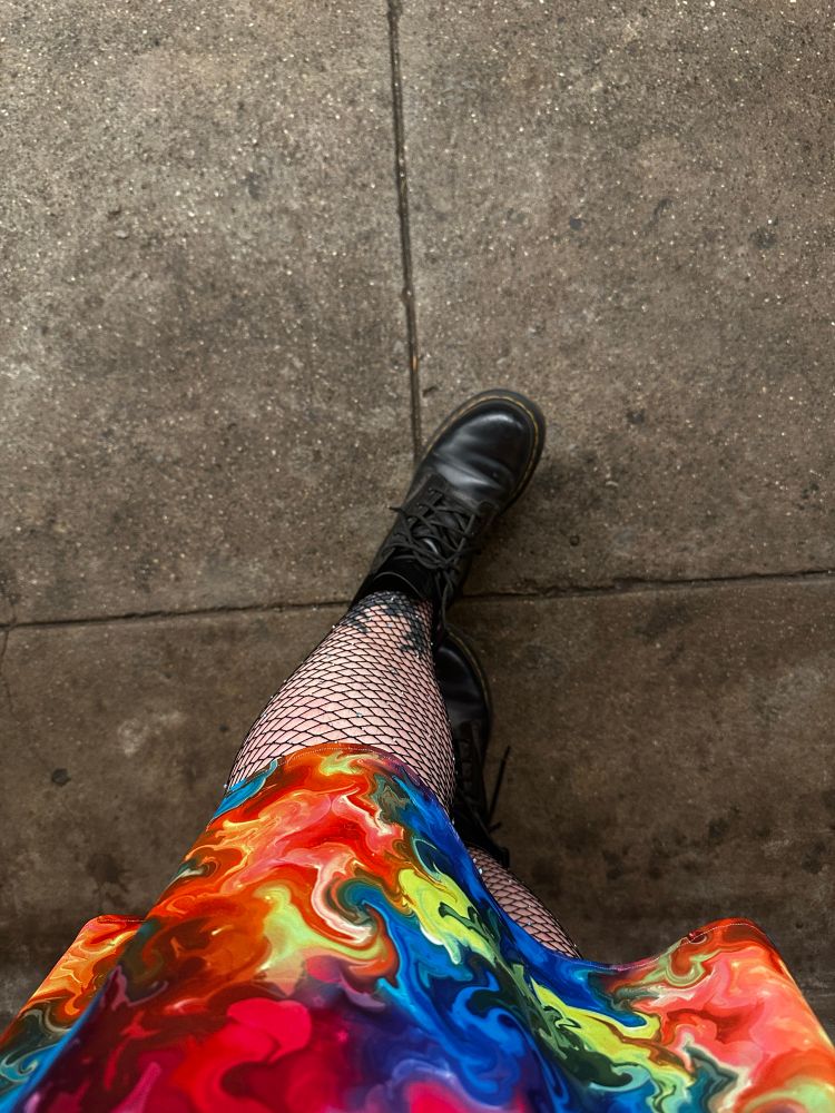 Doc Maretens, fishnets, and a rainbow skirt 