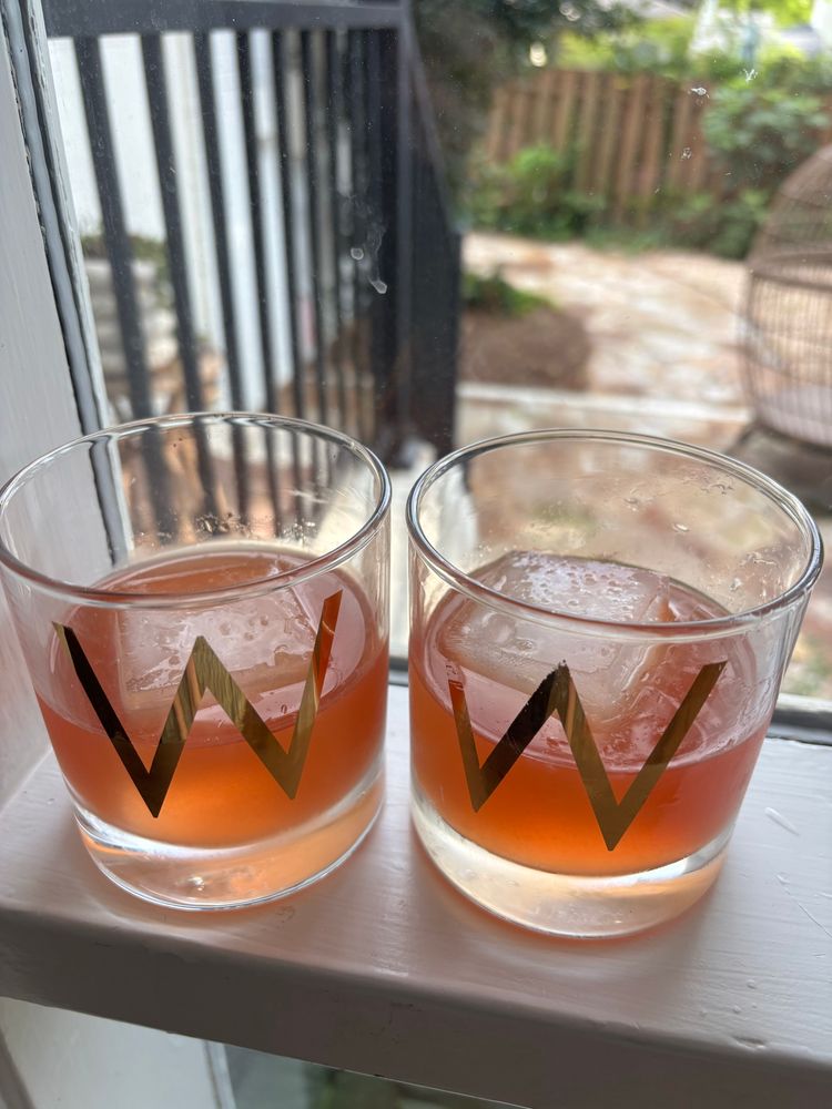 Two red brown cocktails on the rocks 