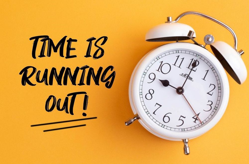 Alarm clock with the words "Time is running out!"