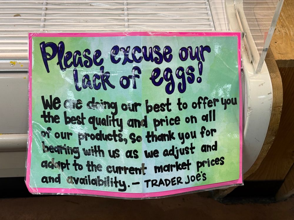 A sign at Trader Joe’s explaining why they have no eggs as they adjust to new prices. 