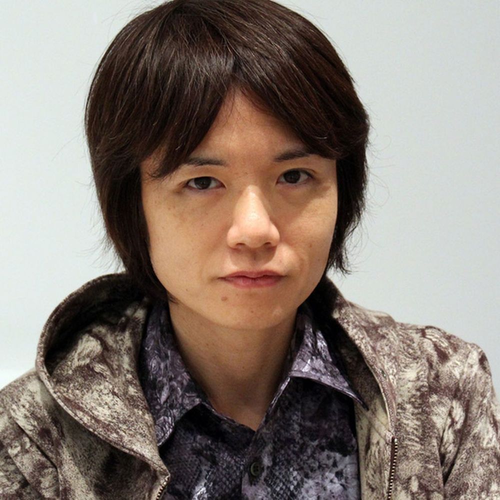 headshot photograph of critically acclaimed video game designer Masahiro Sakurai