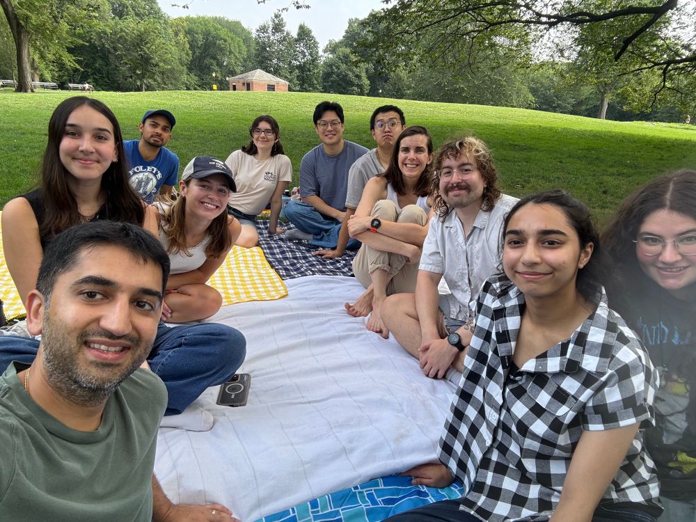Shah lab at a picnic on the Great Hill at Central Park