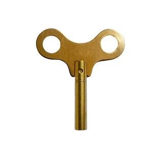 A brass wind-up key, image borrowed from an Etsy listing.
