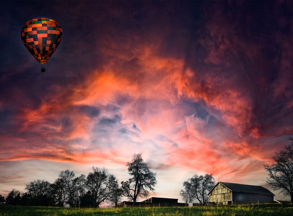 Balloon over Barns in Burning Light
