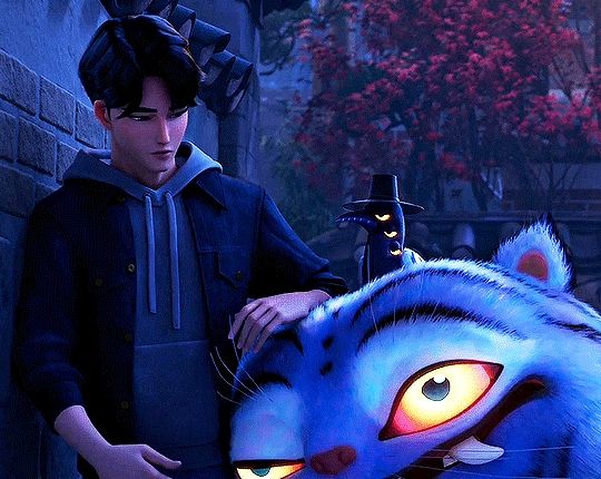 The blue tiger with the 3 eyes magpie with a top hat on its head snuggling to Jinu and getting a pet on its massive head.