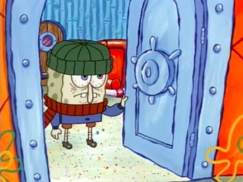 SpongeBob wearing a beanie, scarf, and sweatshirt. He is sick with the suds.