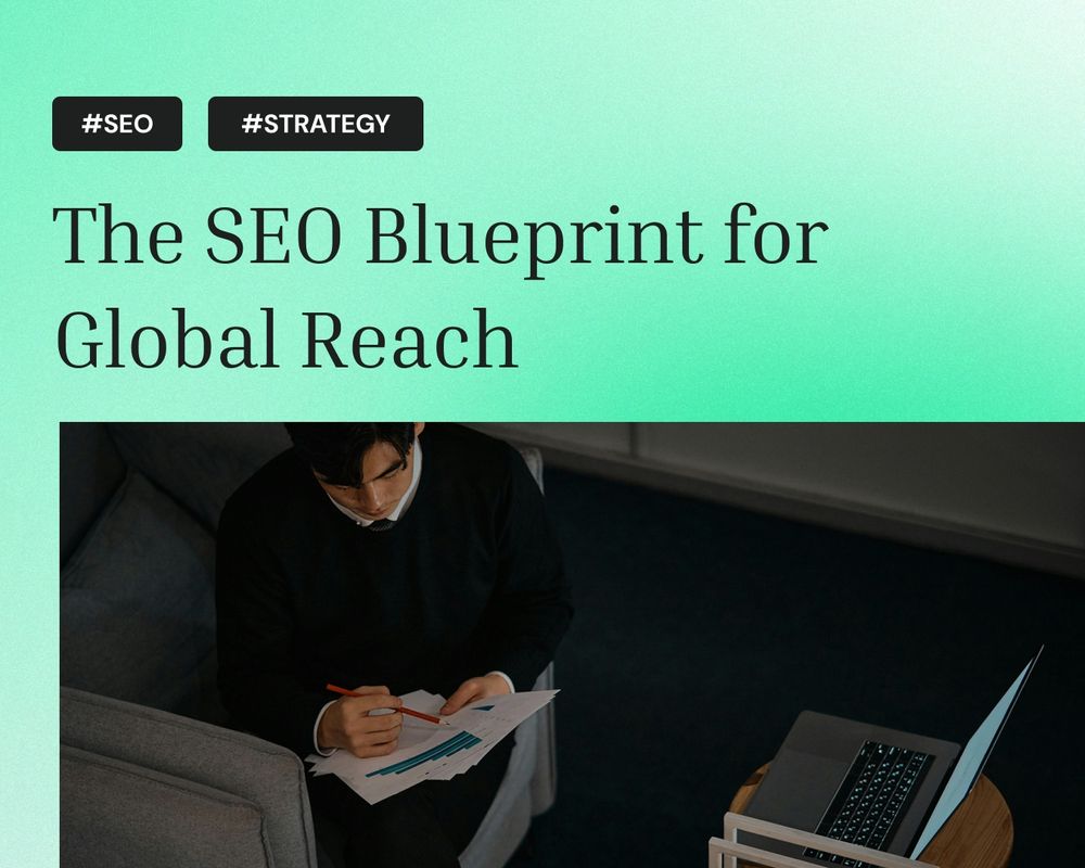A man sitting on a couch with documents and a laptop, analyzing charts. The article headline reads “The SEO Blueprint for Global Reach” with tags #SEO and #Strategy.