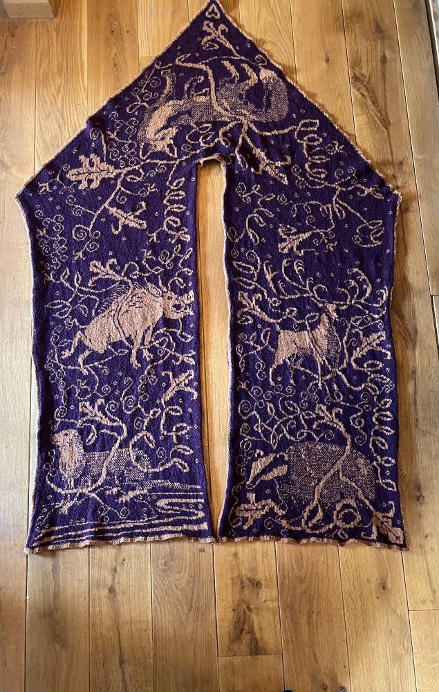 The full Woodland Friends Shawl - showing detail of foliage and animals and also the contruction.