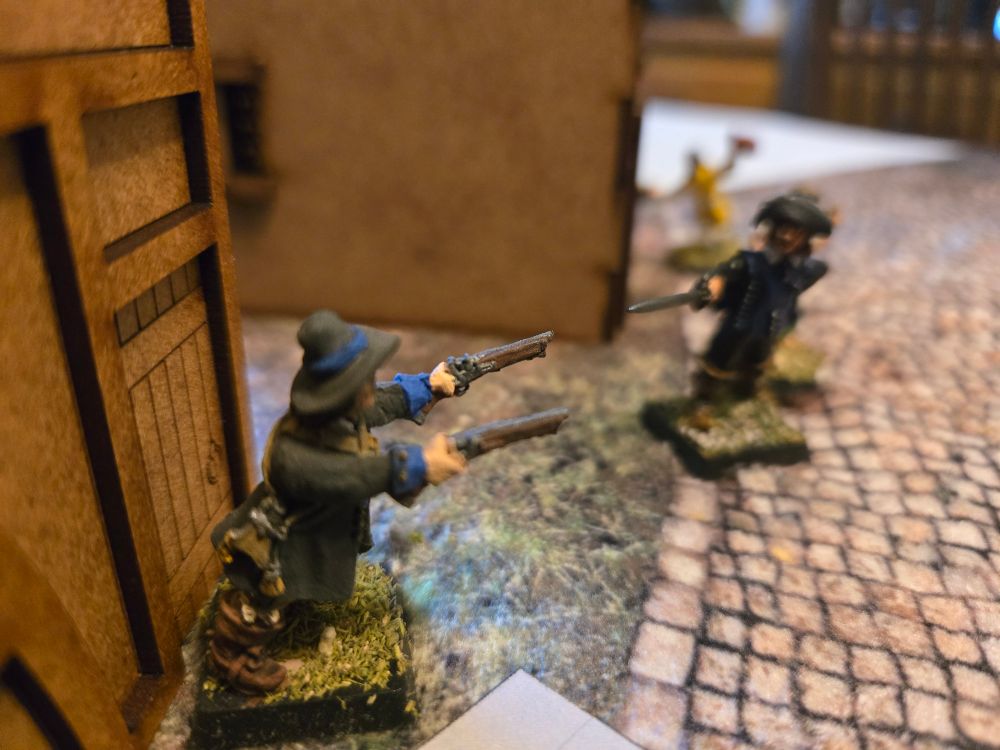 A man with two pistols faces off against a musketeer