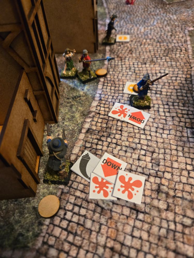 A miniature street fight with wounded markers galore