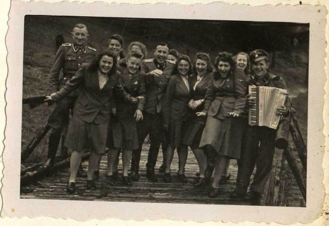 Smiling Nazi staffers at Auschwitz concentration/death camp, 1944, I cannot comprehend why we have to remind people that the Nazis are the fucking bad guys, holy fuck what the FUCK