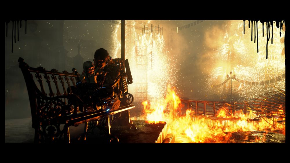 Sam and Lou sitting on a park bench together. Behind them is a massive firebomb that's covered the entire area.