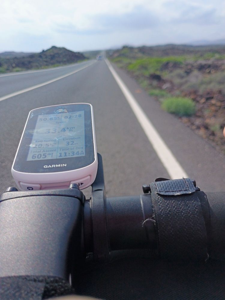 Photo of the cockpit of a bike from the riders POV, showing stem, handlebars and GPS head unit.

The road is rolling, straight into a stiff headwind, as if to emphasize OPs point about being a Rouleur not a climber!