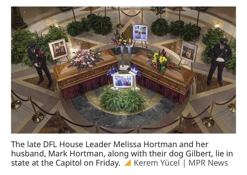 The late DFL House Leader Melissa Hortman and her husband, Mark Hortman, along with their dog Gilbert, lie in state at the MN Capitol on Friday. [shown: two caskets and a pedestal with an urn of ashes] 