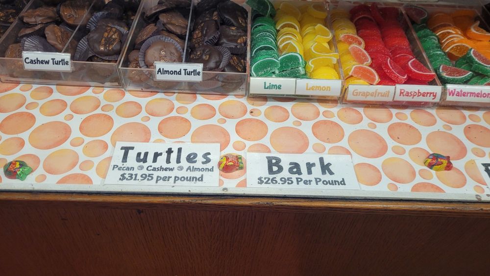 Two signs at a candy shop reading "Turtles" and "Bark"