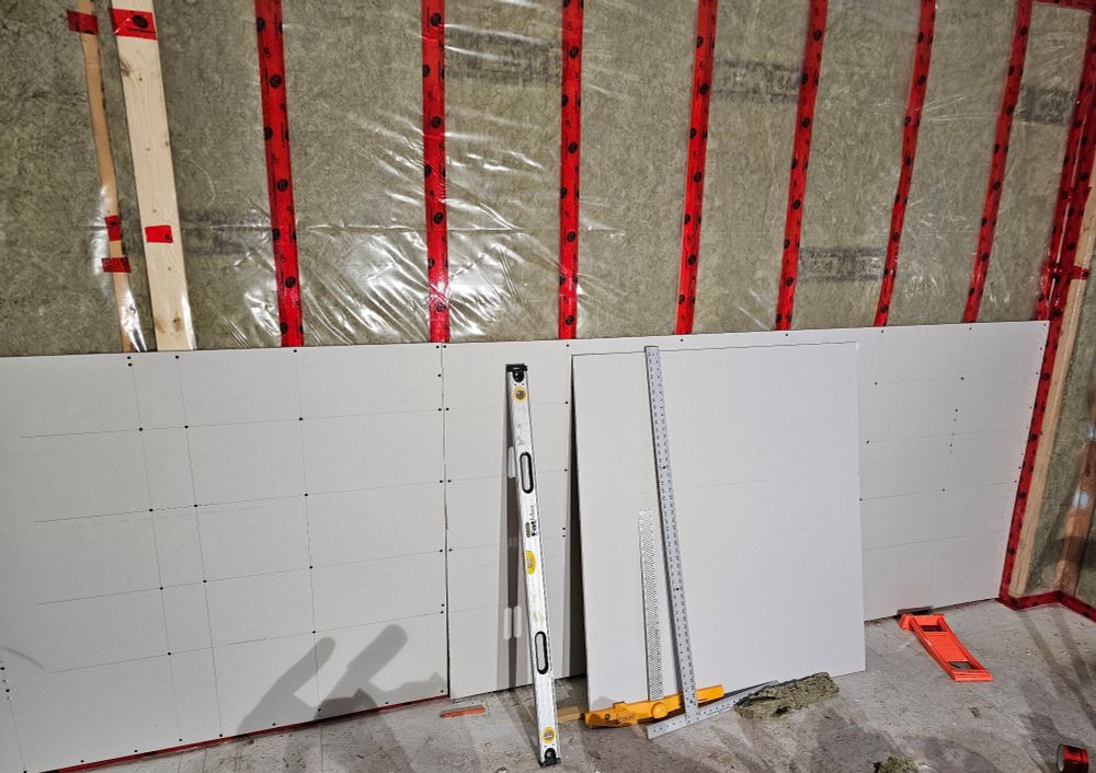 Putting up drywall sheets
