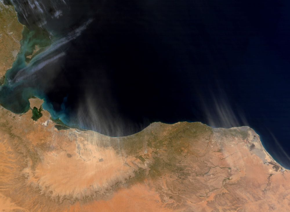 Weather satellite image showing shara dust blown over the mediterranean from the Tunisian and Libyan deserts.