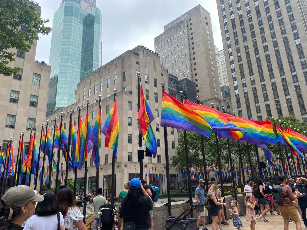Rockefeller center surrounded by pride flags