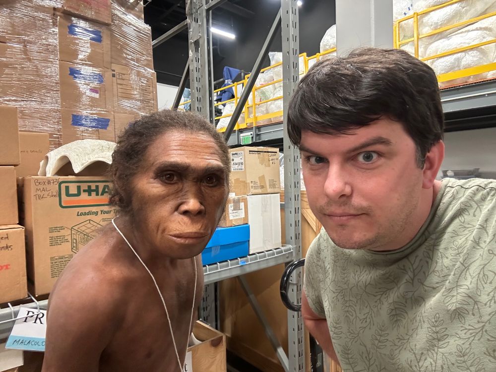 Dino Dad with a Homo naledi sculpture.