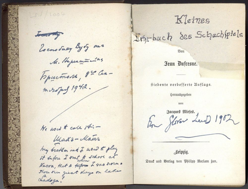 inside cover with handwritten inscriptions in english and german