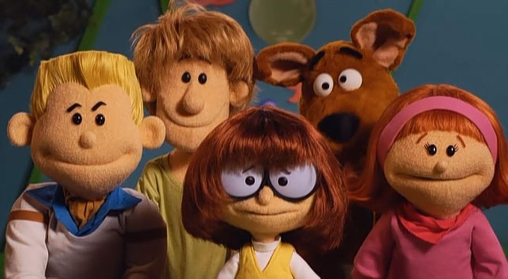 They’re puppets! In the style of A Pup Named Scooby Doo!