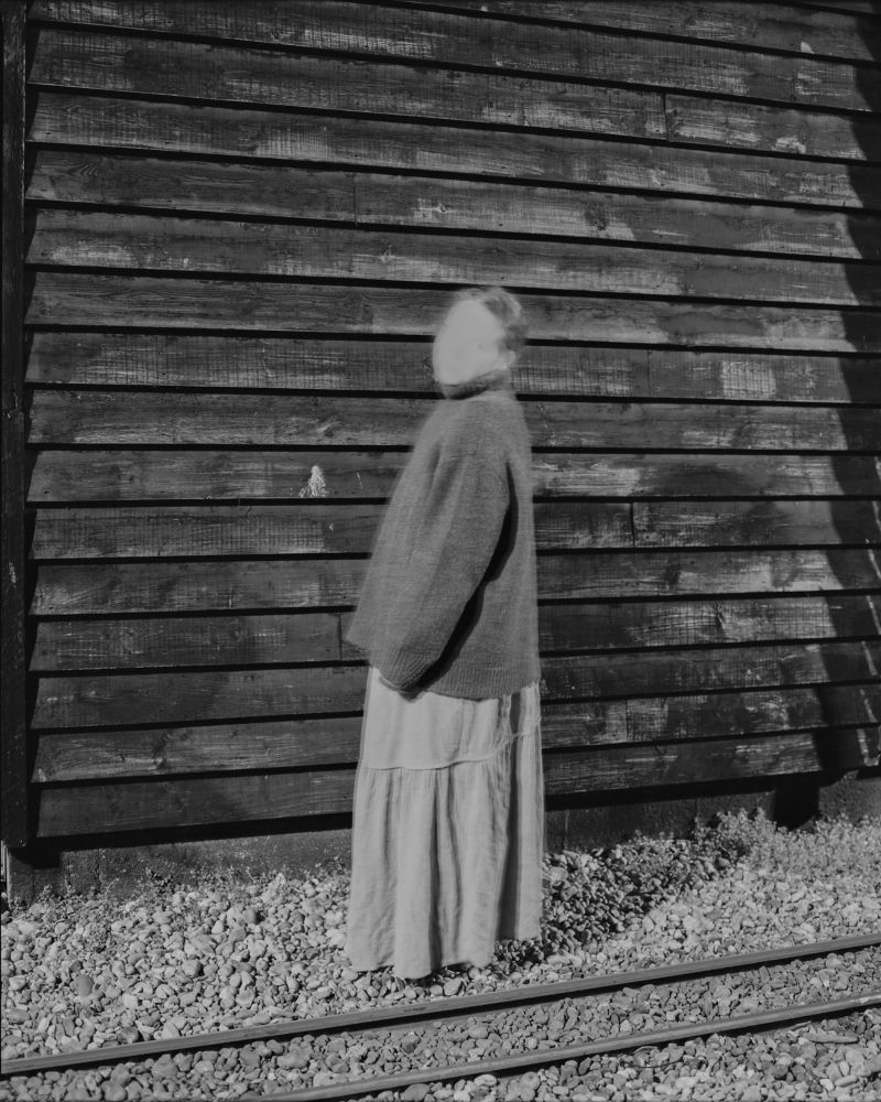 Portrait of Grace down by the historic fishing net huts in Hastings, East Sussex