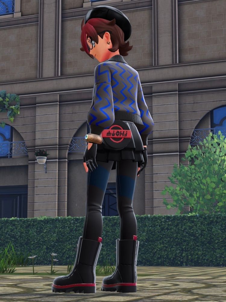 screenshot from the video game Pokemon Legends: Z-A, which shows my trainer Felony L'Eclair (Crime Bébé) standing in the courtyard in front of Hotel Z with her back turned to the camera.