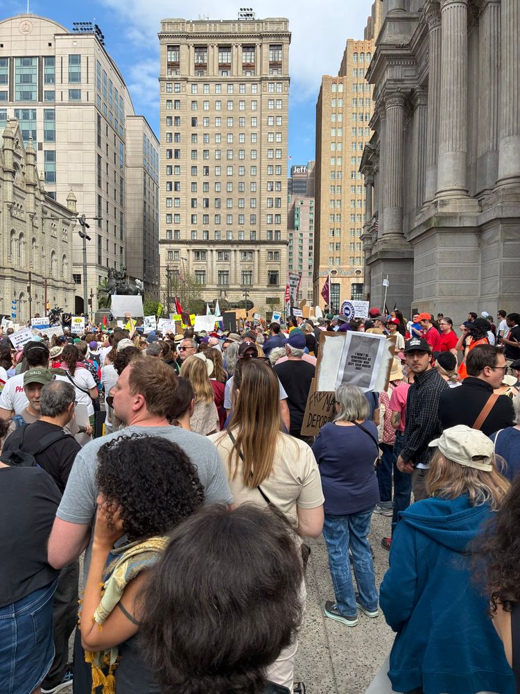 A group of people protesting in Philly. 