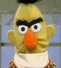 Angry Bert, the muppet, he has big black eyebrows (well, really a unibrow) that slants down in the middle of his face. 