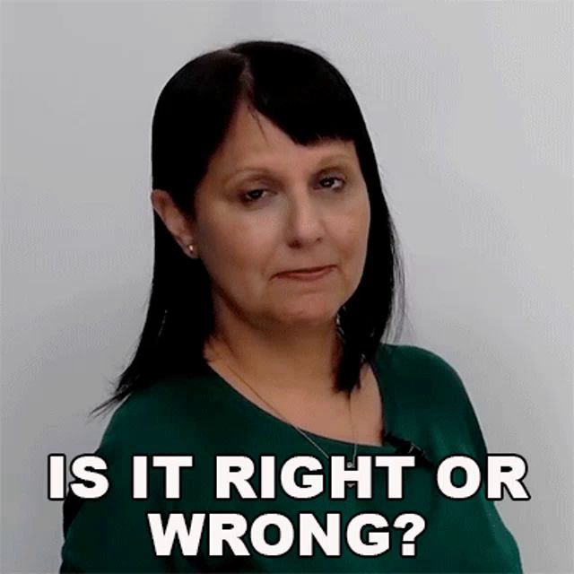 a woman wearing a green shirt is asking if it is right or wrong