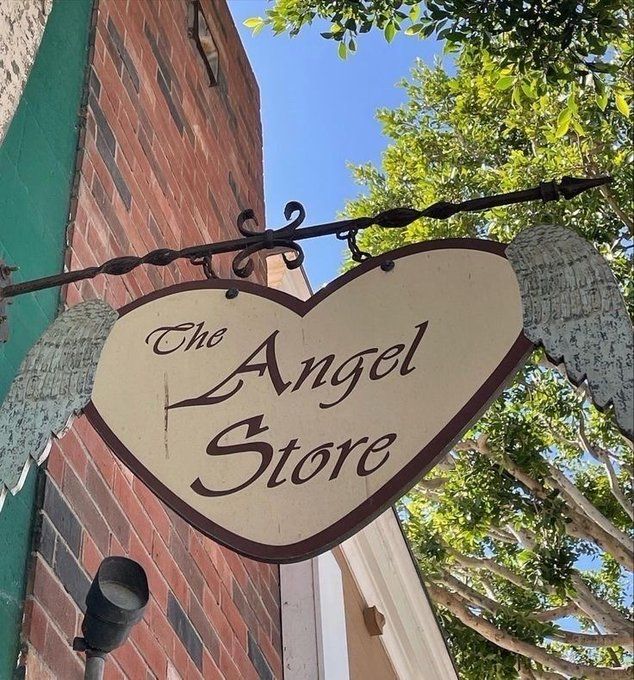 shop sign that says The Angel Store