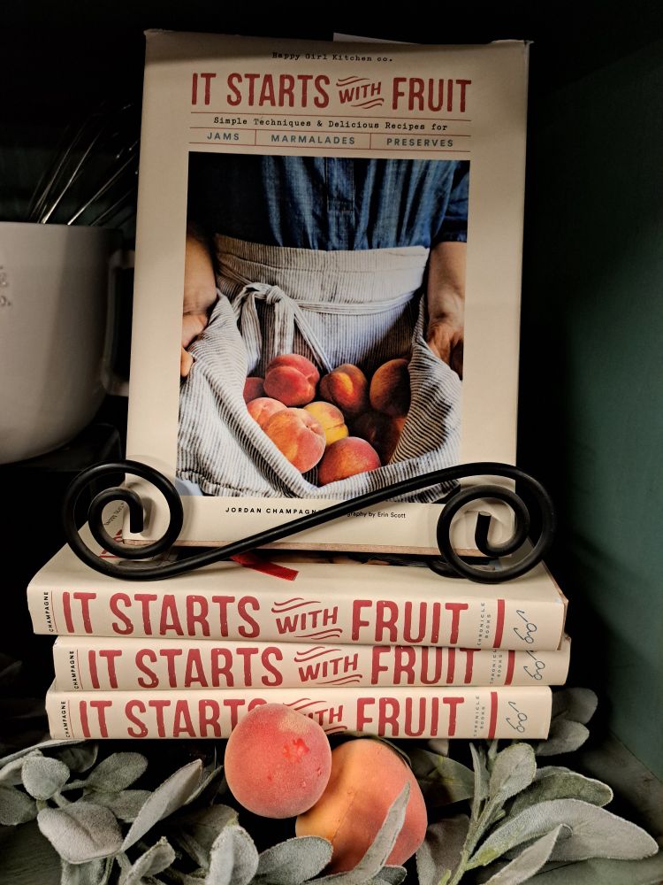 A kitchy book titled "It starts with fruit"