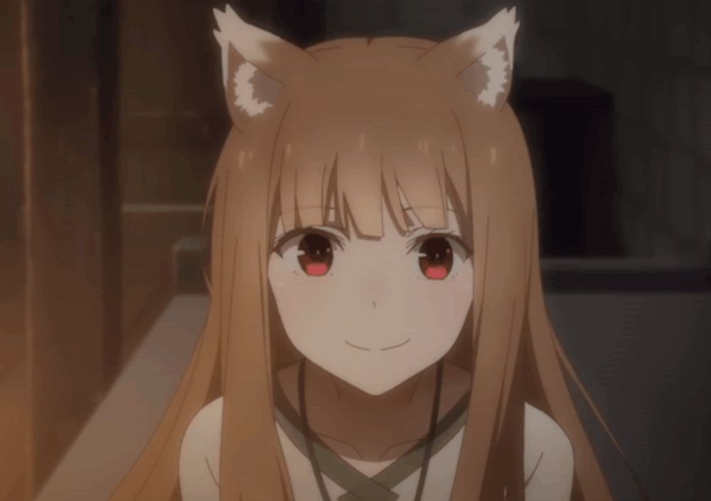 a close up of a girl with fox ears on her head