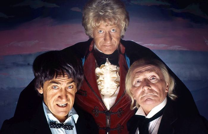 A promotional photograph of three incarnations of the Doctor from the 1973 Doctor Who serial “The Three Doctors.” 