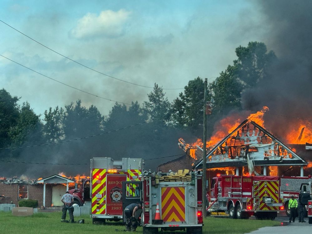 Photo of Pleasant Grove church on fire.