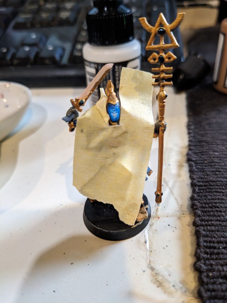 Aeldari Spiritseer covered in a protective"bib" made of masking tape