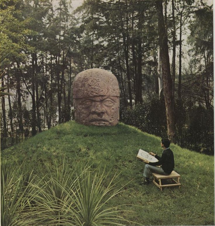 Olmec head and artist. México, 1965