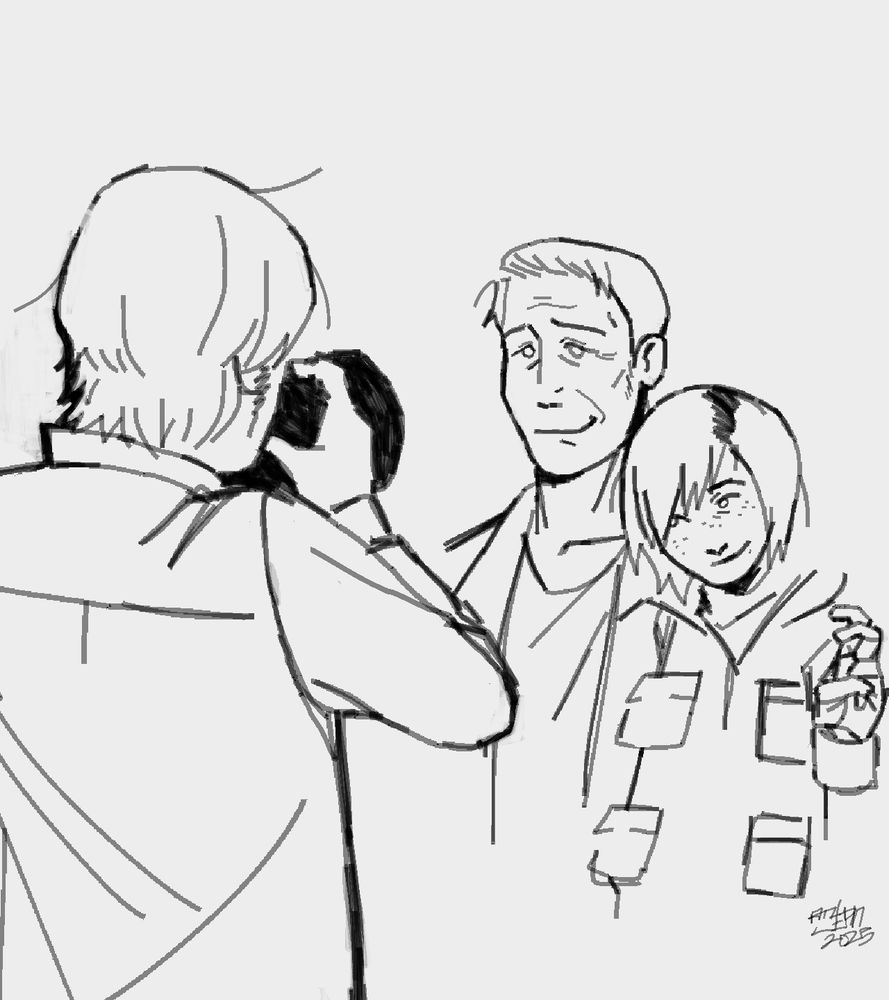 Henry taking a photo of Harry and Heather Mason. Both are smiling and Heather is holding up a peace sign.