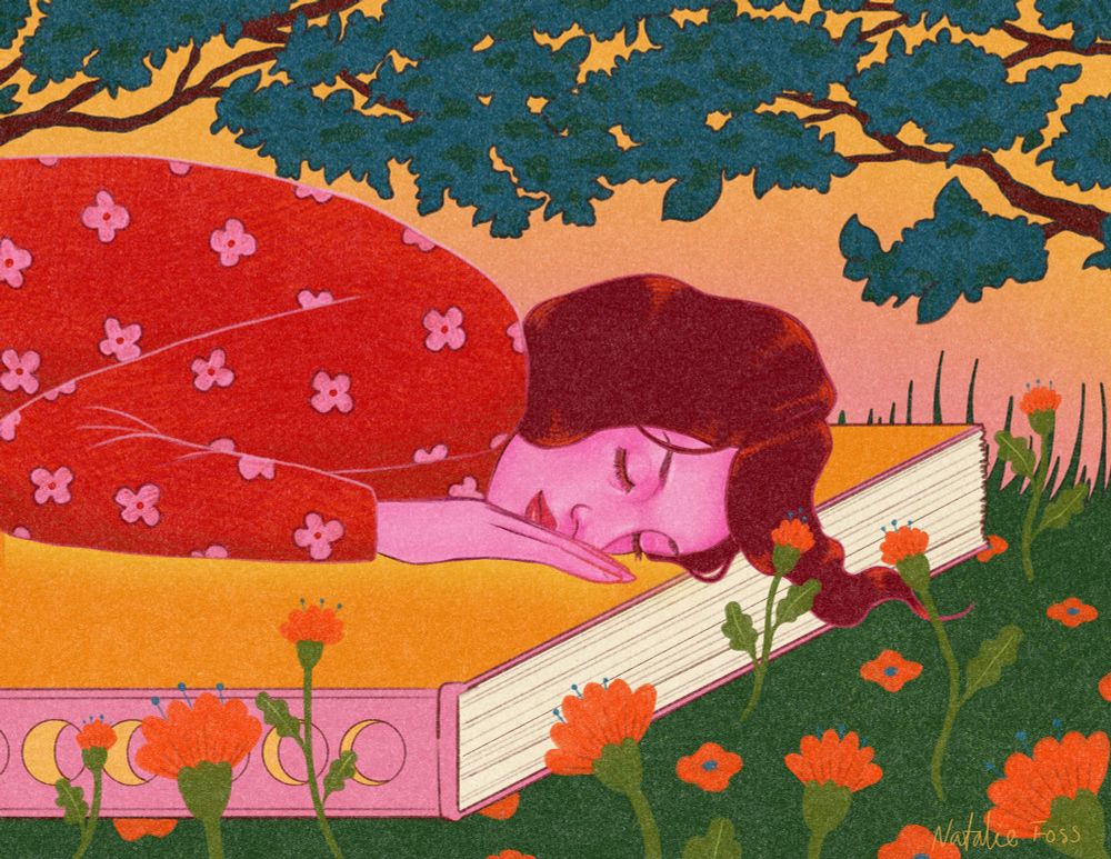 A person in a red sweater lying on top of an oversized book, surrounded by flowers/nature. 