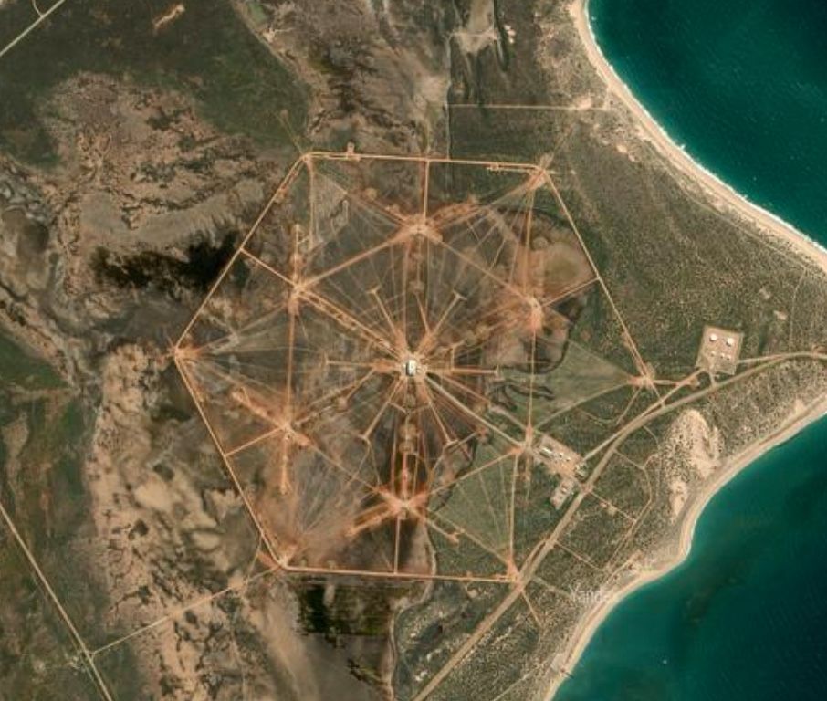 A satellite image of the radio tower array, making out a hexagon and six-sided star
