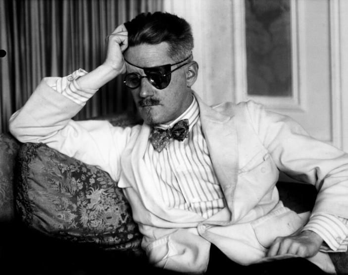 James Joyce holding his head 
Photo by Berenice Abbott