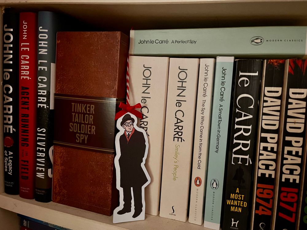 A George Smiley hanging decoration hanging about in the spy section of my book shelves. 