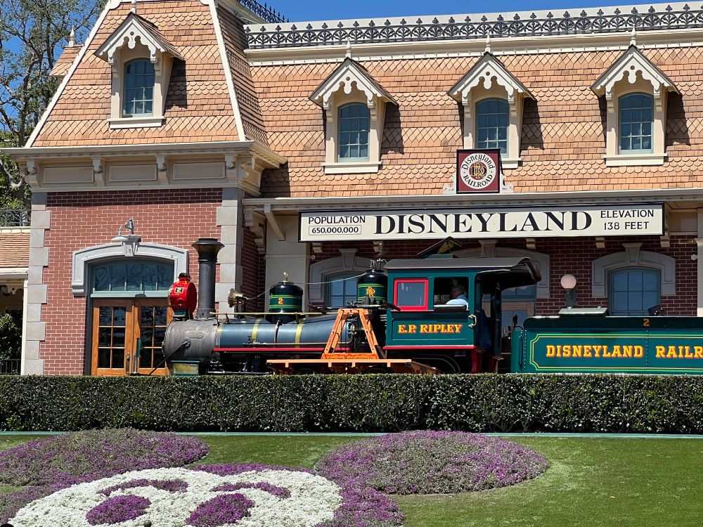 Engine #2, the E.P. Ripley, pulling up to the Main Street Station. It is the engine Walt Disney opened the park with on July 17, 1955.