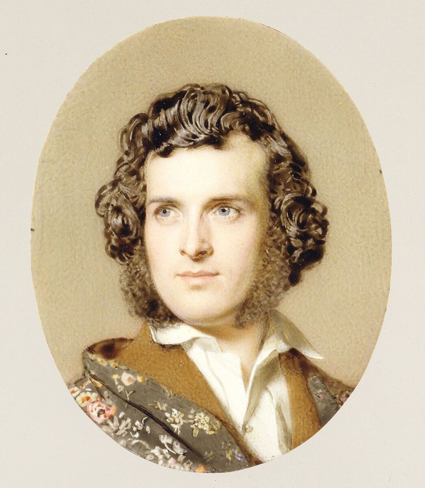 a self-portrait miniature on ivory, Attributed to John Faed (British, Burley Mill, Scotland 1820–1902 Burley Mill, Scotland), painted ca. 1850, in the collection of the Met Museum, New York. He has the curled hair and sideburns typical of mid-century fashion, and has painted these brunette locks in a particularly lustrous, glossy way. It's an informal portrait, so his skirt neck is unbuttoned, and a floral fabric around his shoulders is probably a dressing gown. 
