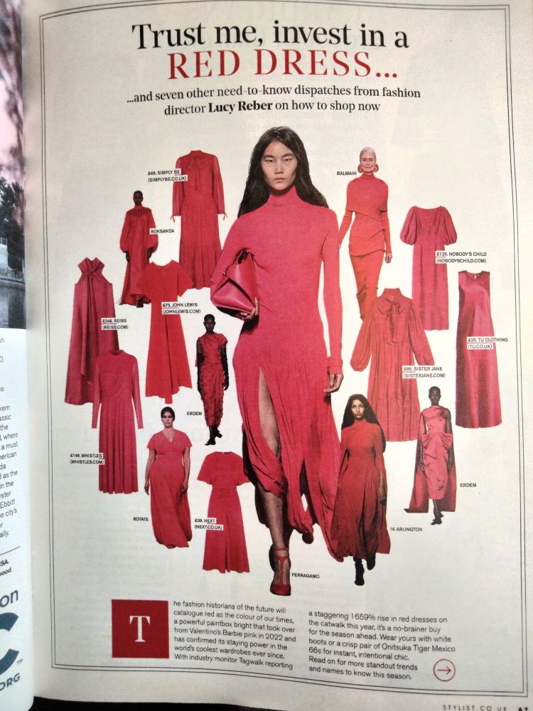 A page from a magazine reading 'Trust Me, invest in a red dress,' with a whole selection of red dresses.